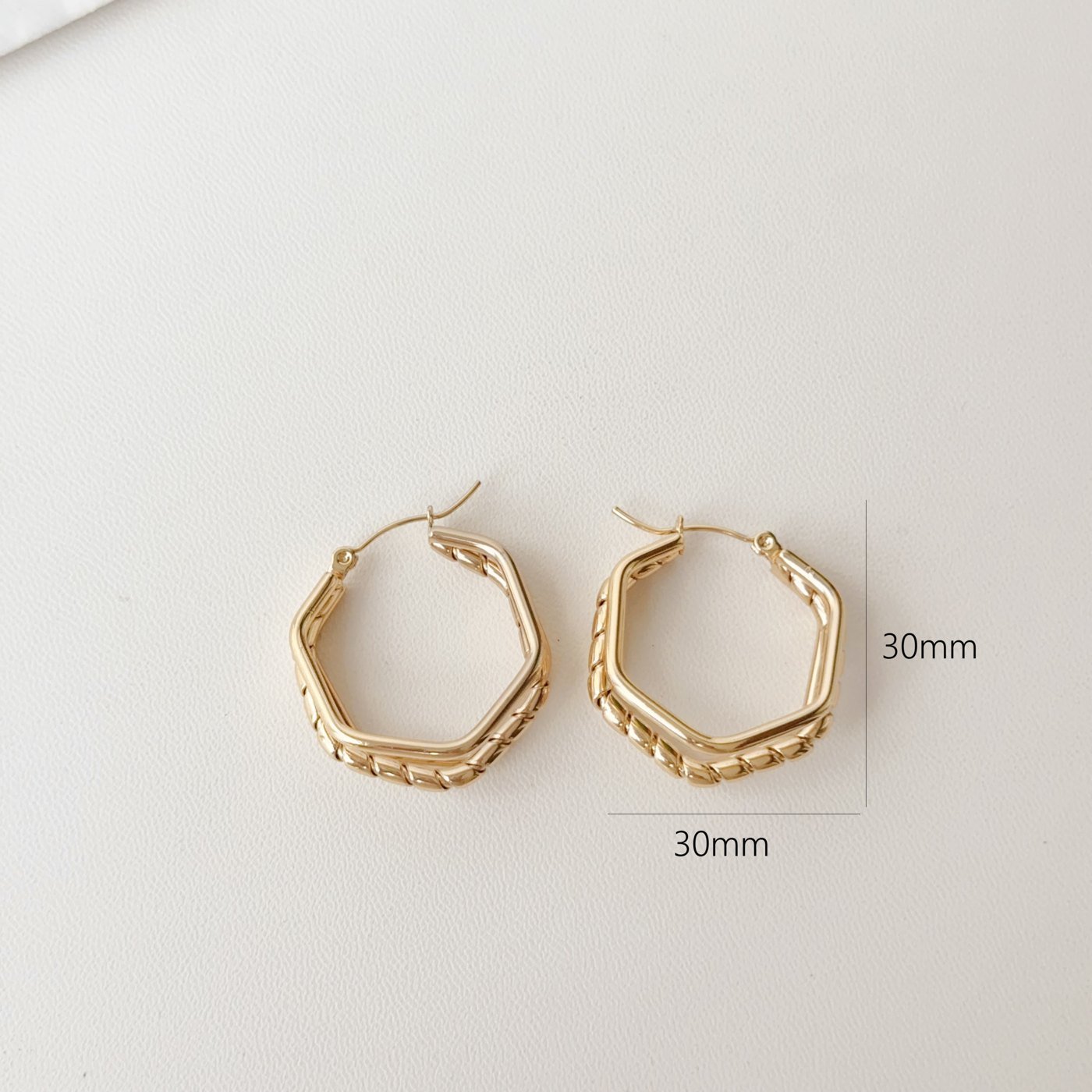 Gold Textured Oval Hoop Earrings - image 1