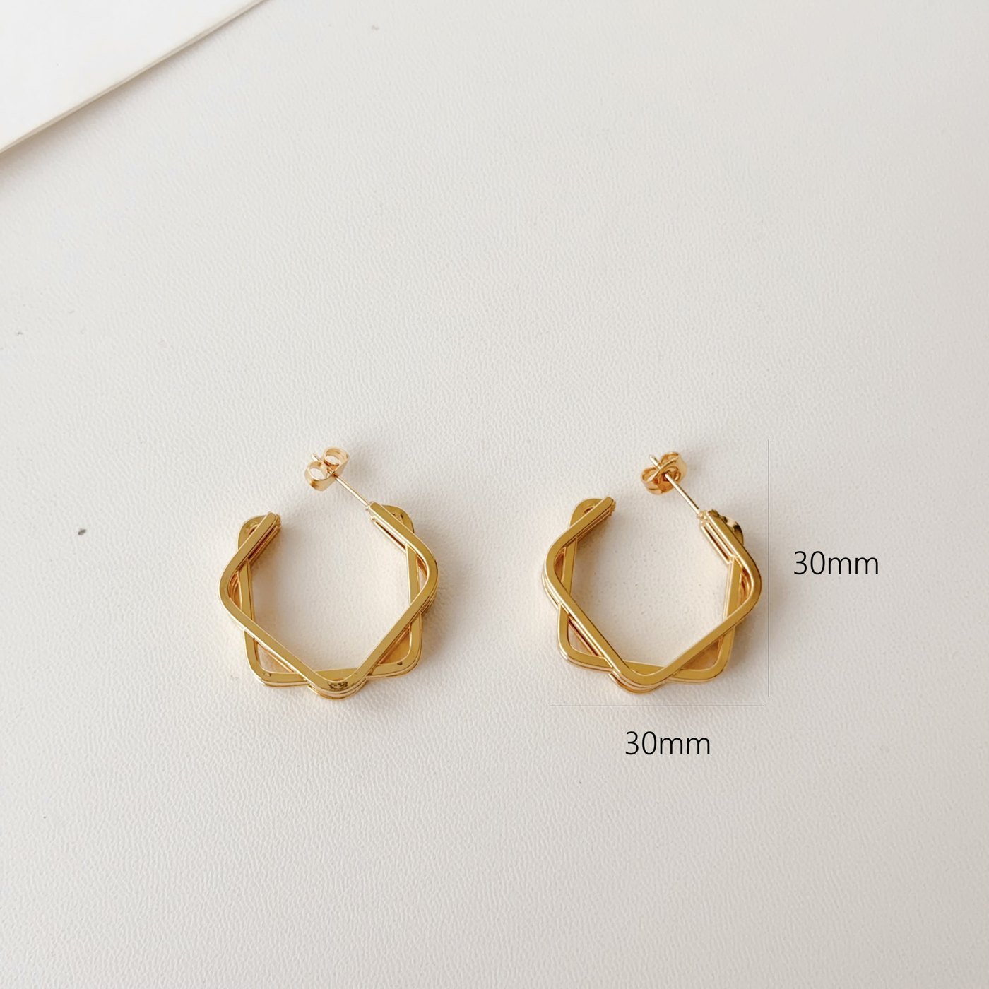 Gold Twisted Mini Hoop Earrings - image 1