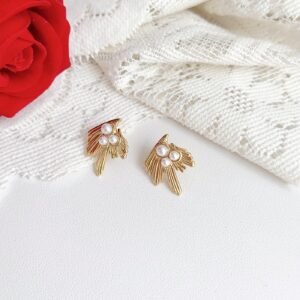 Gold Starburst Stud Earrings - image 1