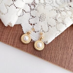 Gold Pearl Dome Stud Earrings - image 1
